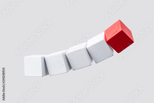 Abstract floating wooden dice on white background