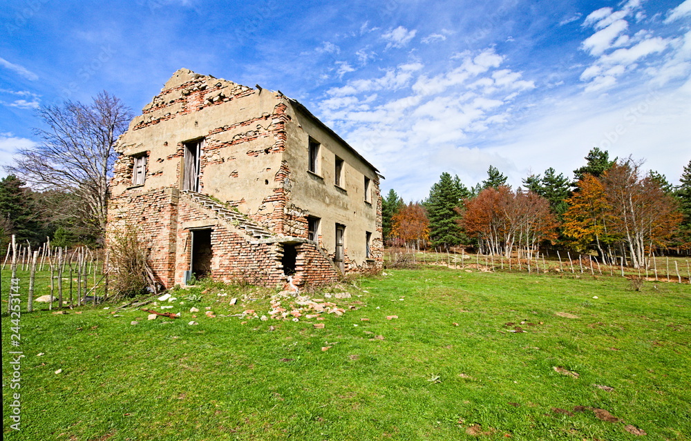 ruined building, barn, ruin, in the middle of a meadow, Sila national park, Calabria, Italy