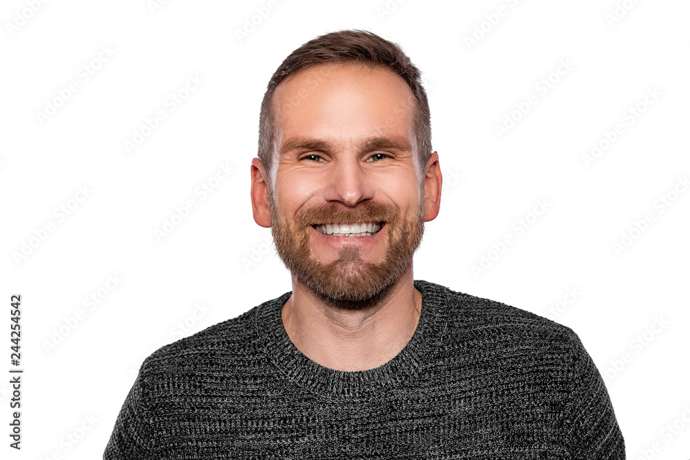 Portrait of a young attractive man with a beard on a white background. Portrait of a young attractive man with a beard on a white background.
