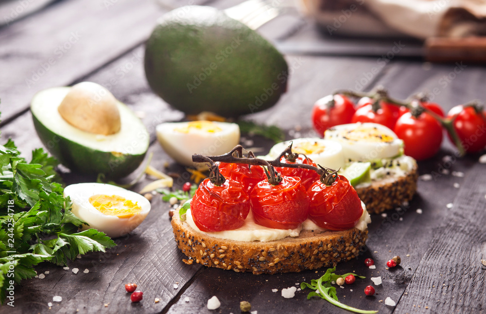 Set of different bruschettas on dark wooden table. Set of different bruschettas on dark wooden table.