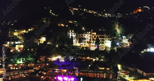 Wallpaper Mural Aerial drone footage of yachts and boats docked in Port Riposto, Giarre, Sicily- in the shadow of Mount Etna. Night  Torontodigital.ca