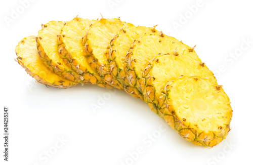 pile of sliced fresh pineapple isolated on white background