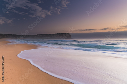 Fototapeta Naklejka Na Ścianę i Meble -  Sunrise Seascape the Beach and Low Cloud Bank