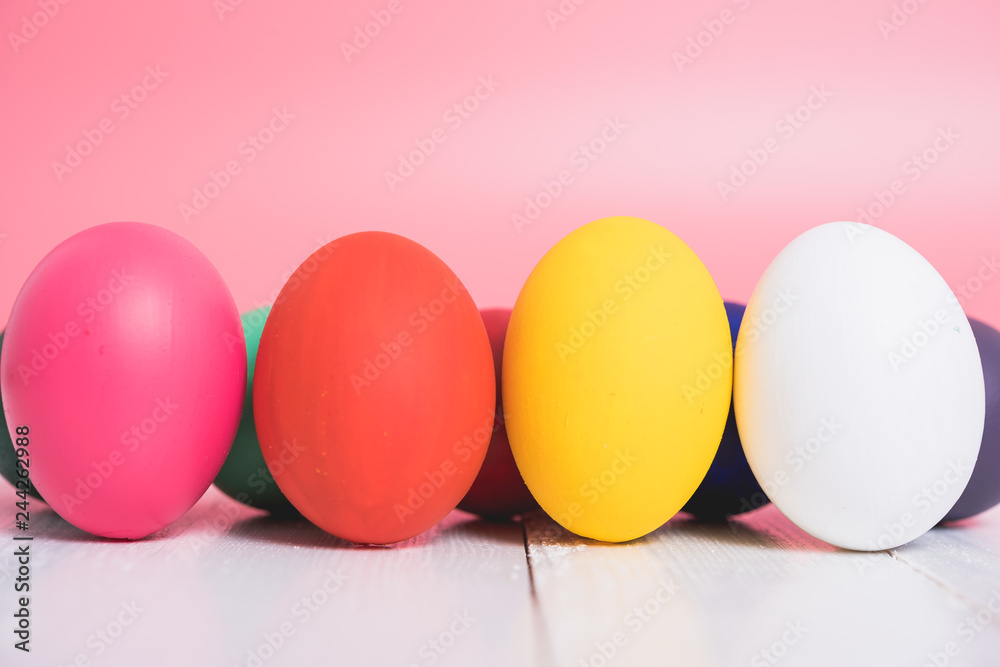 Easter eggs clean on wooden and pink background Easter eggs clean on wooden and pink background