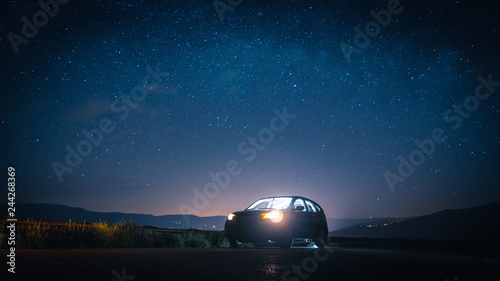 car in front of stars
