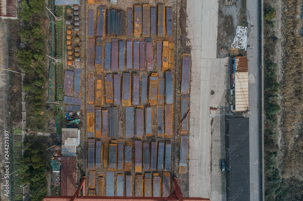 aerial view of steel plates and metal profiles stocked in a factory