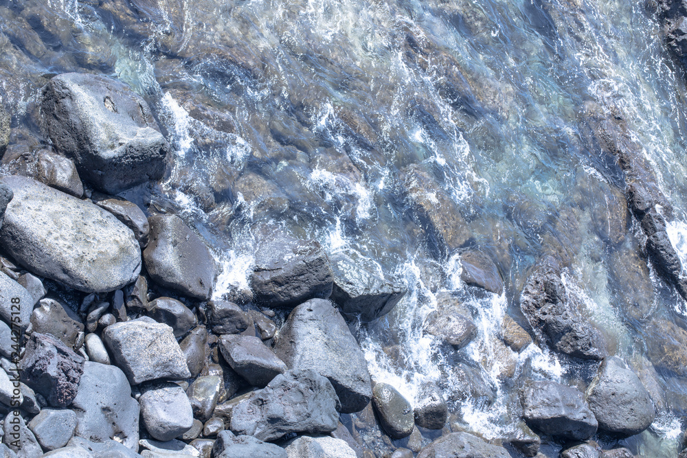 Beautiful stones in the water at Cape Teno. Tenerife. Canary Islands. Spain Beautiful stones in the water at Cape Teno. Tenerife. Canary Islands. Spain