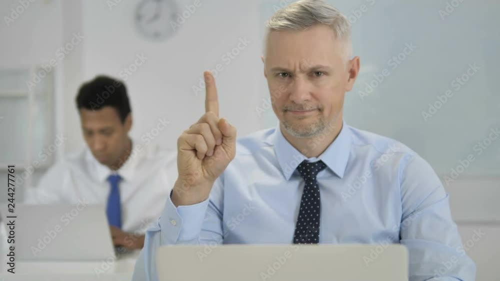 No, Grey Hair Businessman Waving Finger in Denial No, Grey Hair Businessman Waving Finger in Denial