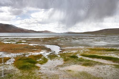 China, Tibet. Rain over the lake Ngangla Ring Tso in summer