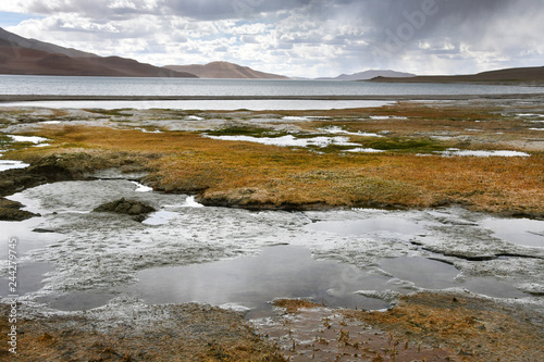 China, Tibet. Rain over the lake Ngangla Ring Tso in summer © irinabal18