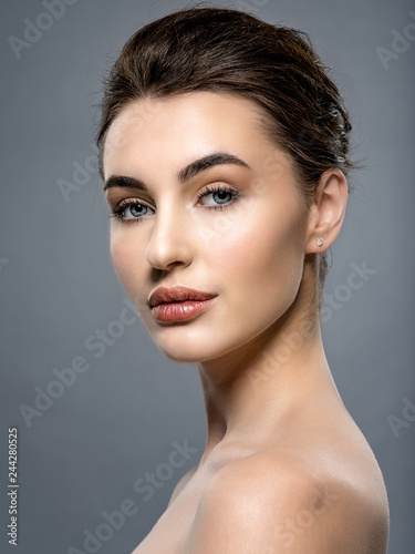 Beautiful face of  a caucasian woman with clean fresh skin.