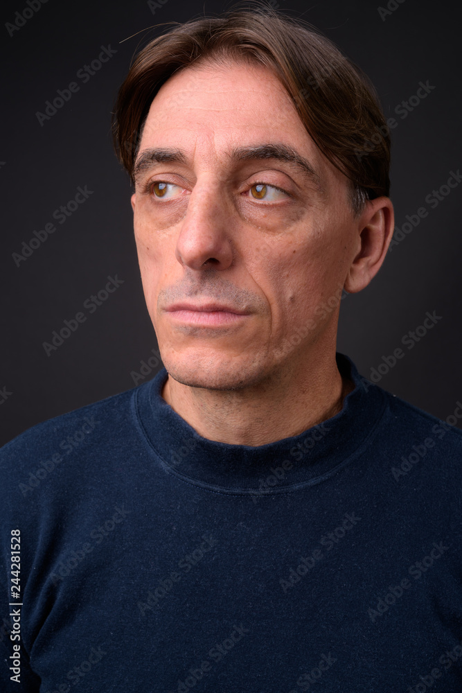 Face of mature handsome Italian man thinking Face of mature handsome Italian man thinking
