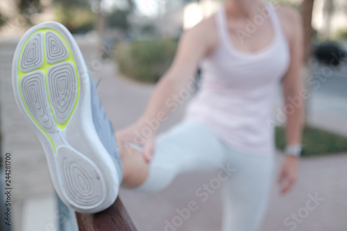 Morning stretchm runing shoe from a wide angle perspective