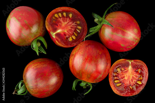Brown cherry tomatoes on white