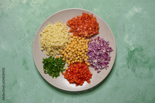 Arabic Food: Bulgur wheat, vegetable and chickpea pilaf. Set of ingredients.

 photo