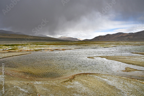 China, Tibet. Rain over the lake Ngangla Ring Tso in summer photo