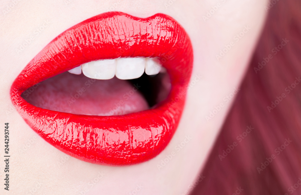 Obraz premium Red lips, sexy lip. Beautiful makeup, sensual mouth. Lipstick or lipgloss. Beauty sensual lips, beautiful lip, bright lipstick. Close up, macro with beautiful mouth, sensual makeup.