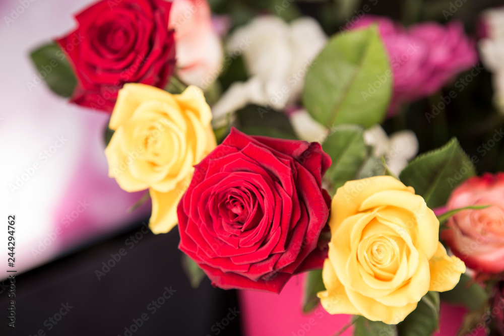 Fototapeta premium Bouquet of roses on a black background for valentine's day.