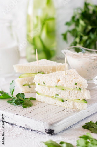 Summer snack mini sandwiches with cucumber and yogurt sauce