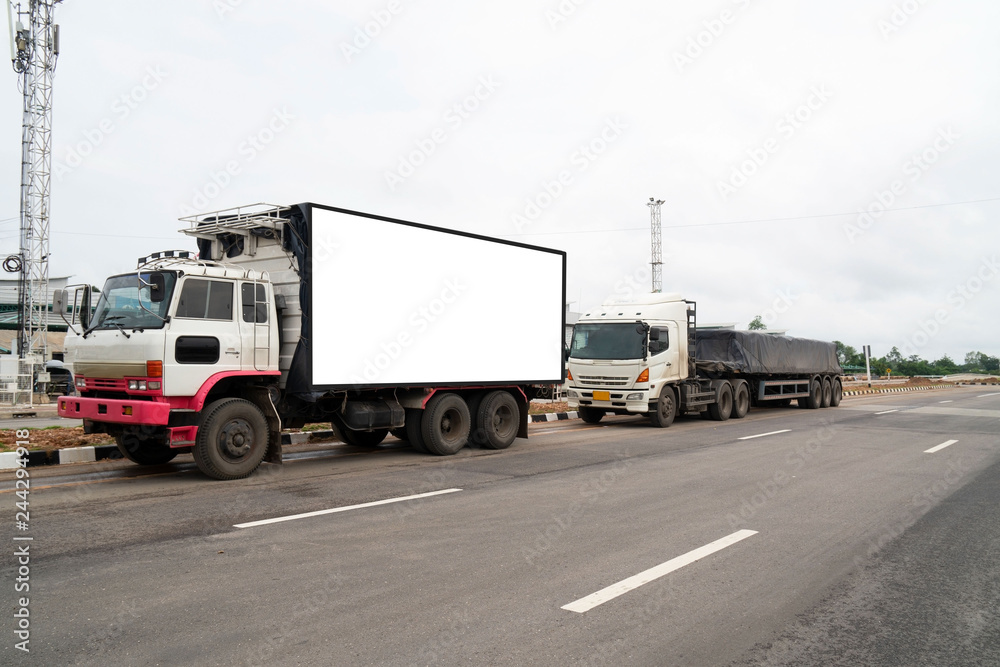 container trucks Logistic by Cargo truck on the road .empty white billboard .Blank space for text and images. container trucks Logistic by Cargo truck on the road .empty white billboard .Blank space for text and images.
