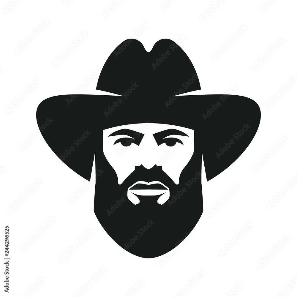Bearded cowboy in a hat. Cool American man Bearded cowboy in a hat. Cool American man