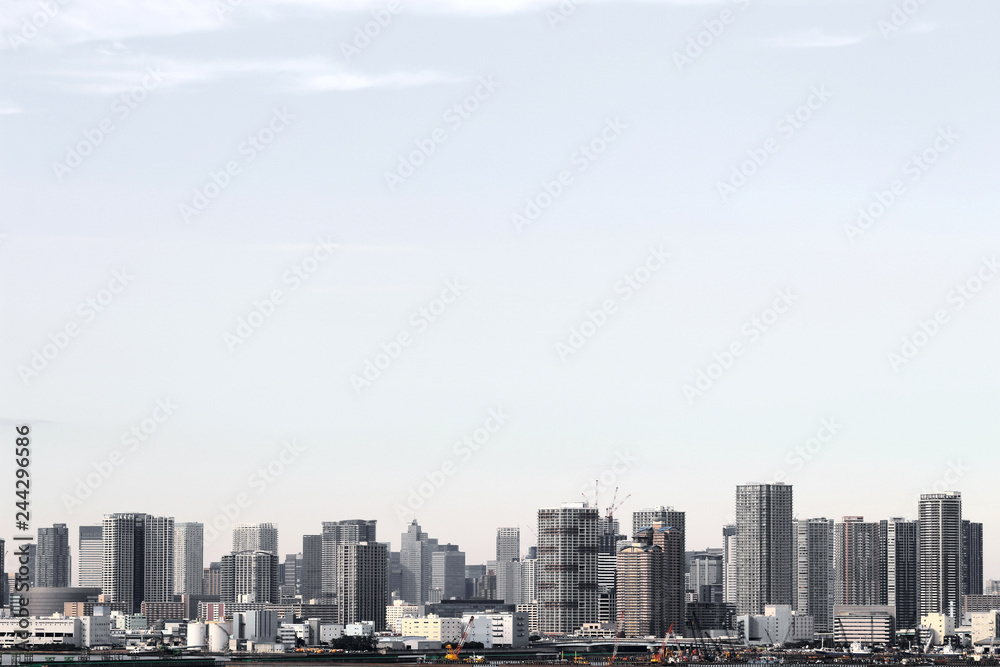 A scenery of a high-rise apartment that stands on the waterfront in Tokyo A scenery of a high-rise apartment that stands on the waterfront in Tokyo