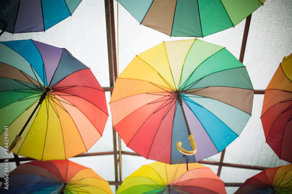 Colorful umbrellas background. Colorful umbrellas in the sky