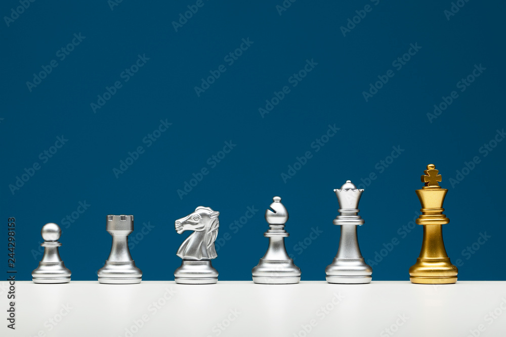 Chess board standing from the crowd concept Chess board standing from the crowd concept
