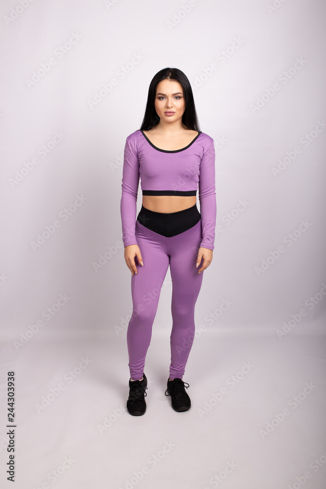 Full length portrait of a young fitness woman in sportswear Full length portrait of a young fitness woman in sportswear