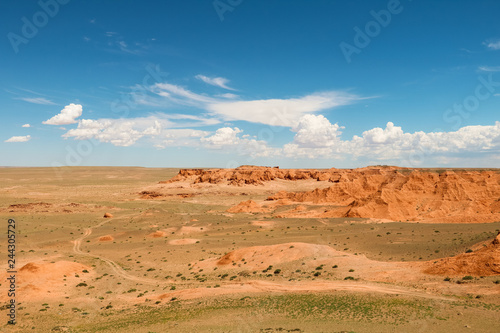 View onto the Flaming Cliffs (Bajandsag) in the heart of Gobi Desert on a perfect blue summer day (Gobi Desert, Mongolia, Asia)