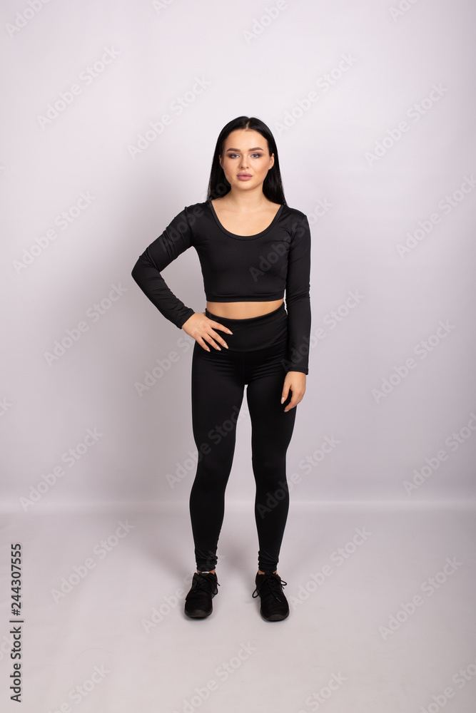 Attractive and sportive woman in leggings and top. Attractive and sportive woman in leggings and top.