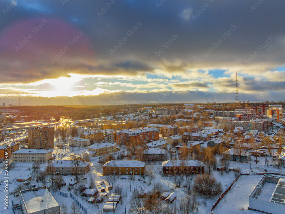 Old part of city in winter sunset, aerial view