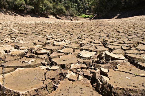 Dry cracked river bed. Drought concept image. 