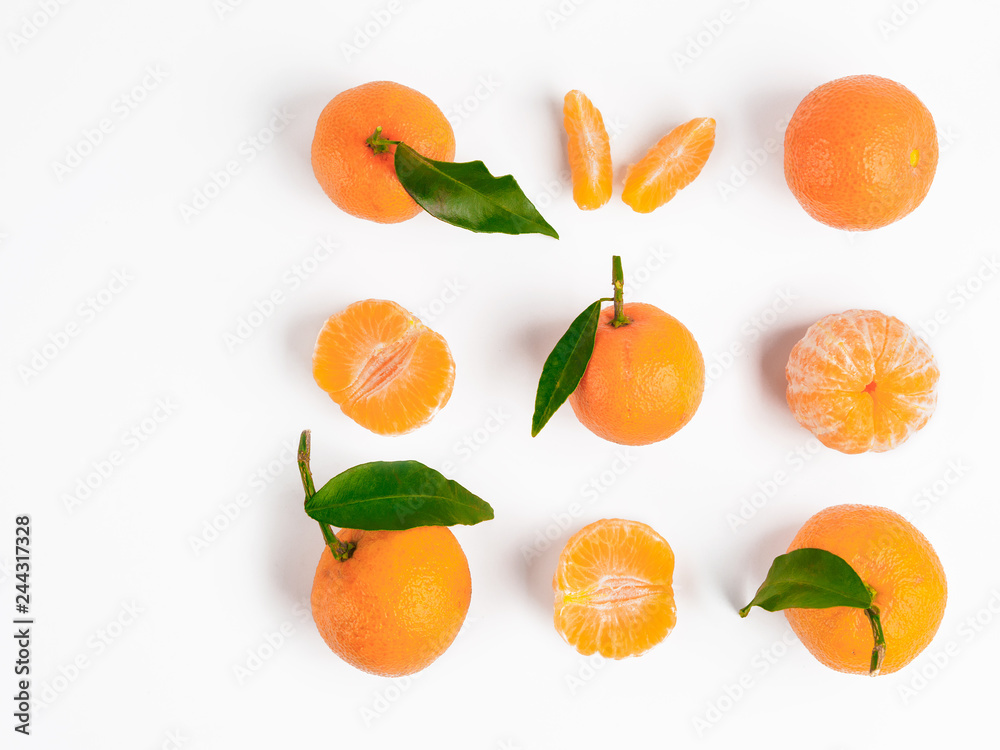 Christmas mandarin or tangerines seamless pattern. Isolated on white with clipping path. Top view or flat-lay. Copy space. Christmas mandarin or tangerines seamless pattern. Isolated on white with clipping path. Top view or flat-lay. Copy space.