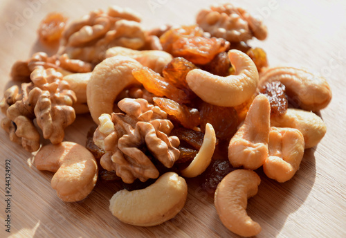 Mix of walnuts, cashew and sultana. Organic snack close up