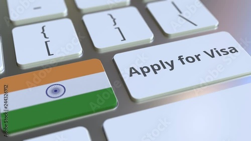 APPLY FOR VISA text and flag of India on the buttons on the computer keyboard. Conceptual 3D animation photo