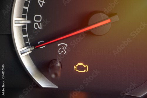 warning light engine in car dashboard photo