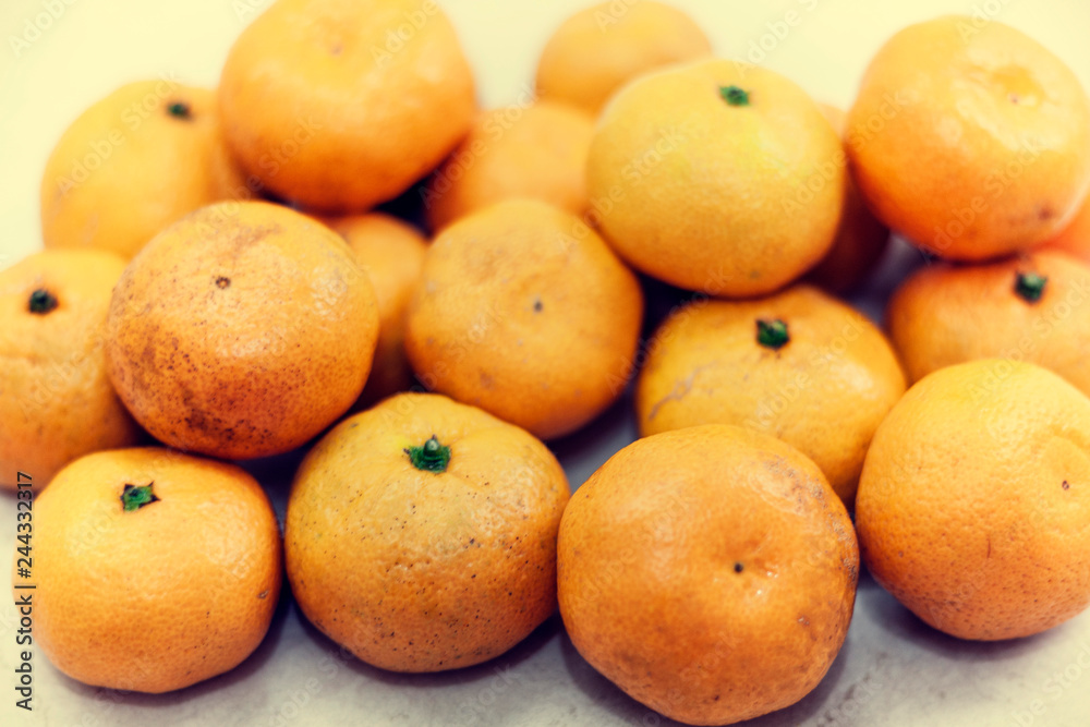 Fresh whole mandarin oranges background , top view. Fresh whole mandarin oranges background , top view.