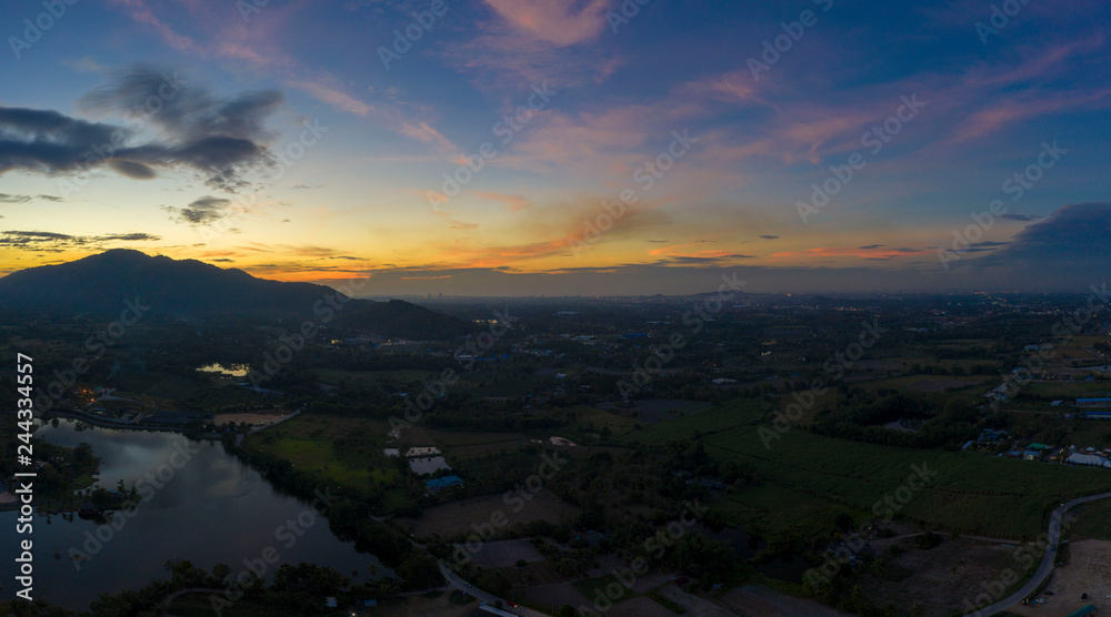 Aerial view. of sunset or sunrise and blue sky on the mountains Twilight sky.