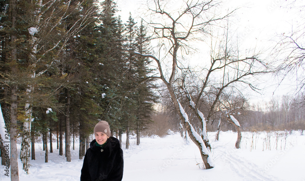 girl in the woods in winter