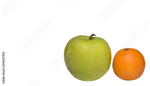  green apple and one orange on white background