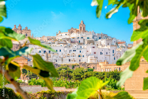 View of Ostuni white town, Brindisi, Puglia (Apulia), Italy, Europe. Old Town is Ostuni's citadel. Ostuni is referred to as the White Town. Architecture and landmark of Italy. photo