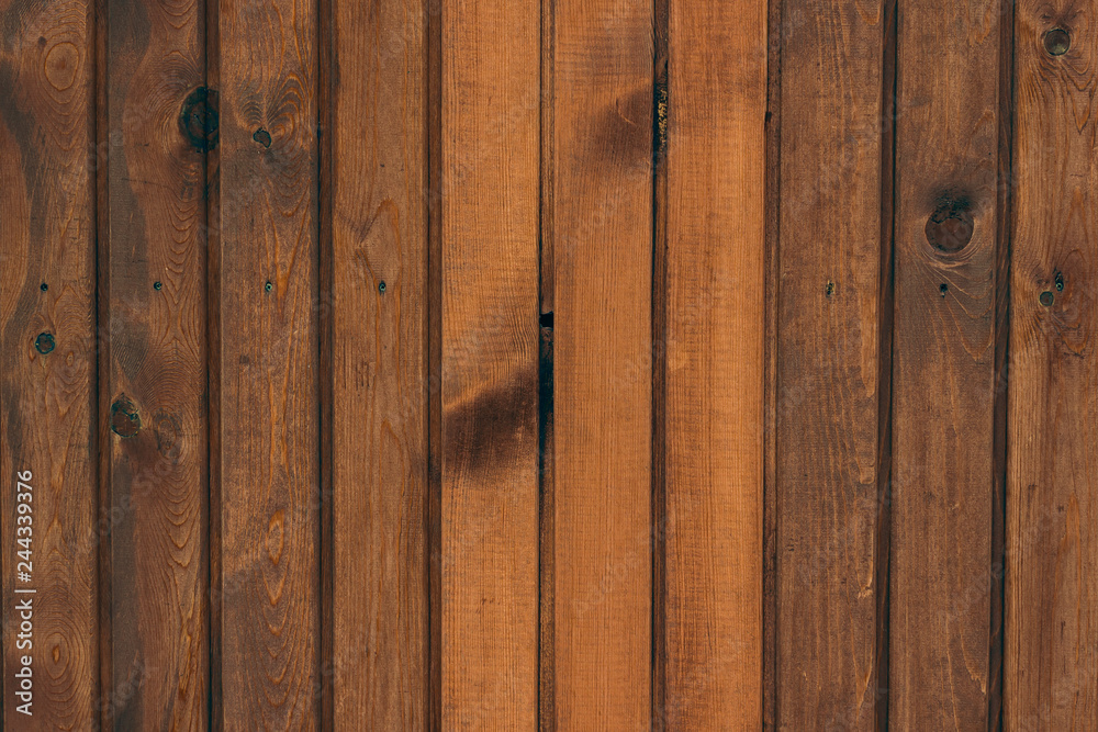 Fototapeta premium Old wooden boards as background. Wall of wooden house.