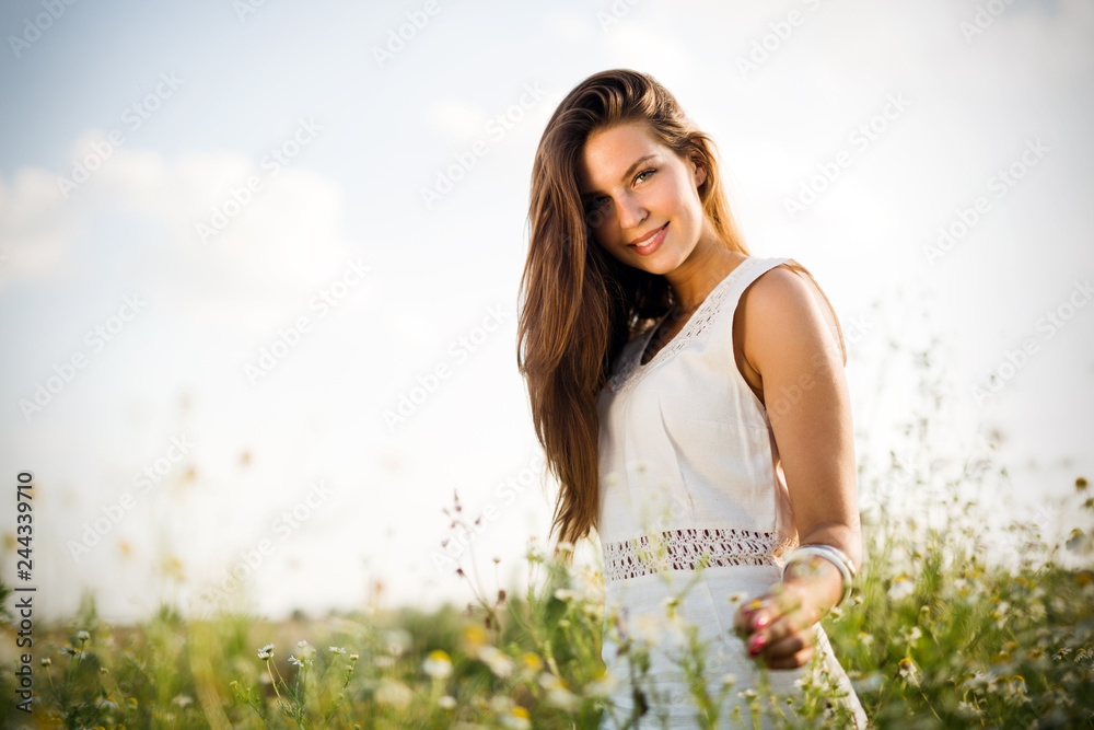 Young beautiful woman spending time in nature Young beautiful woman spending time in nature