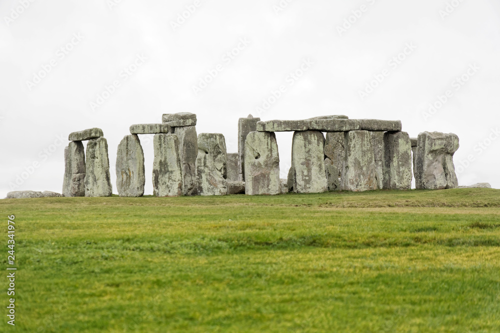 The stone monument Stonehenge a cloudy day,  built in the late Neolithic period, around 2500 BC for unknown reason