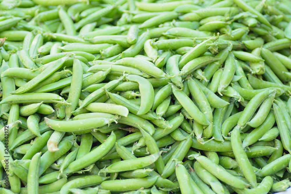 Macro details of fresh Green peas at street side vegetable market in India Macro details of fresh Green peas at street side vegetable market in India