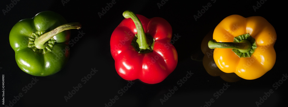Vegetables on black background, pepper, paprika Vegetables on black background, pepper, paprika