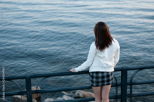 young woman on the pier © tltstorm