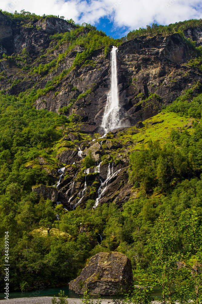 Giant Rjoandefossen waterfall by the Flam to Myrdal Railway Line Norway