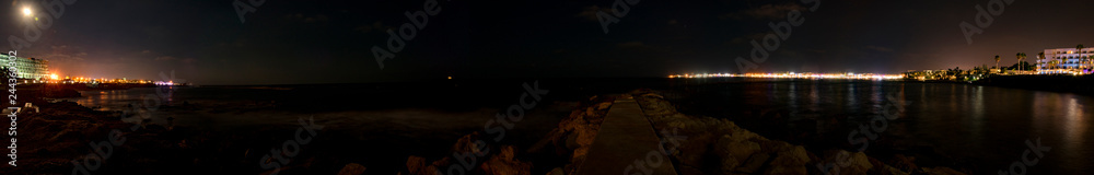 Cyprus, Paphos, night city panorama lights, coastline and sea